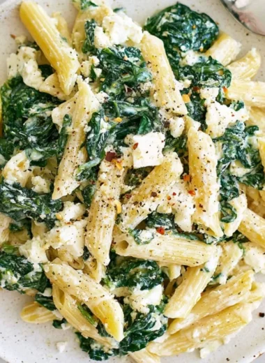 Cozy spinach feta pasta dish, perfect for comfort food lovers.