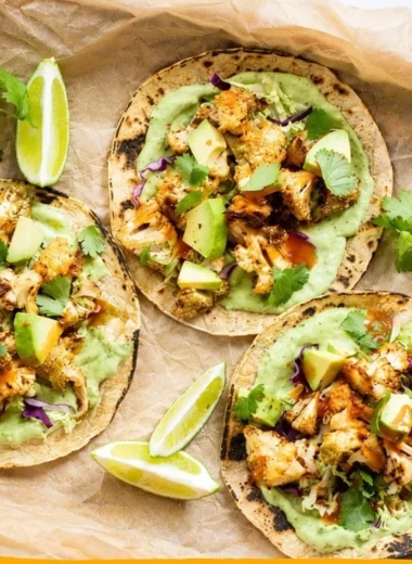 Cauliflower tacos topped with avocado cream for a delicious vegetarian meal