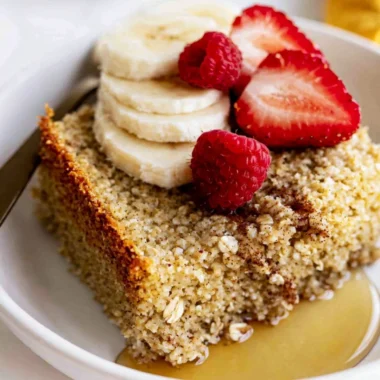 Delicious baked oatmeal served in a warm bowl with fruits and nuts