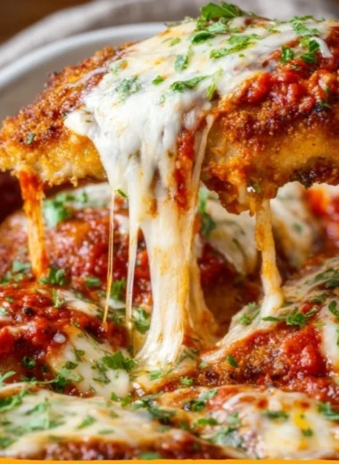 Cozy classic chicken parmesan with melted cheese and marinara sauce