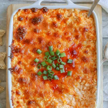 Cozy cottage cheese buffalo chicken dip in a bowl with chips on the side