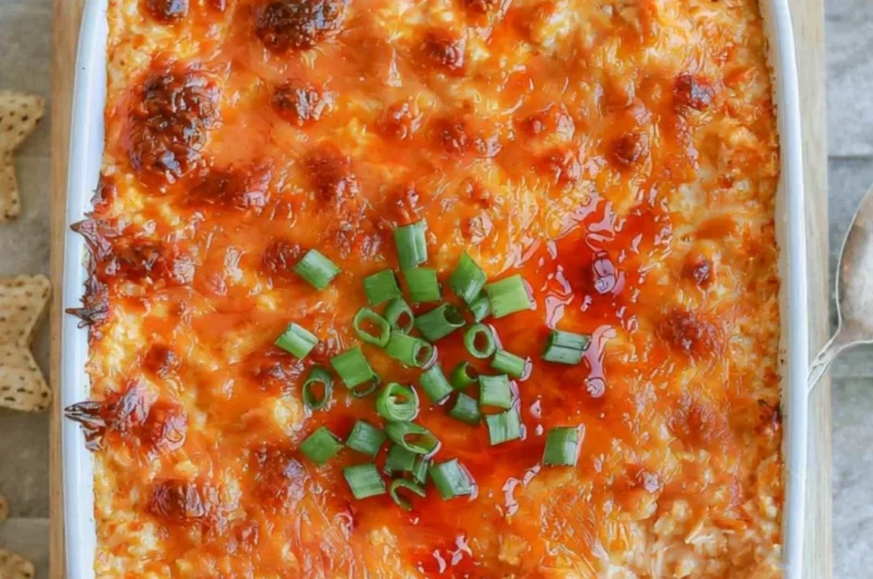 Cozy cottage cheese buffalo chicken dip in a bowl with chips on the side