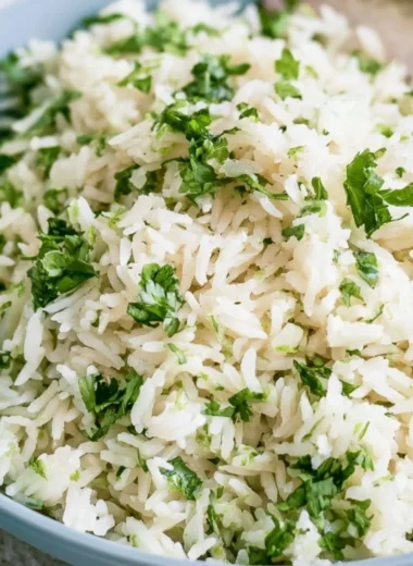 Delicious cilantro lime rice served in a bowl, inspired by Chipotle's recipe