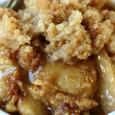 Delicious apple pear walnut crisp dessert served in a cozy setting