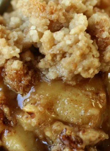 Delicious apple pear walnut crisp dessert served in a cozy setting