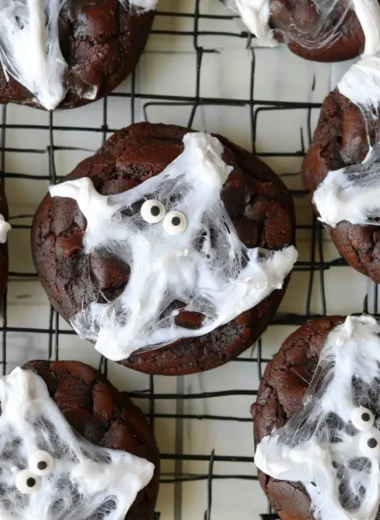 Halloween Double Chocolate Spider Web Cookies with spooky decorations