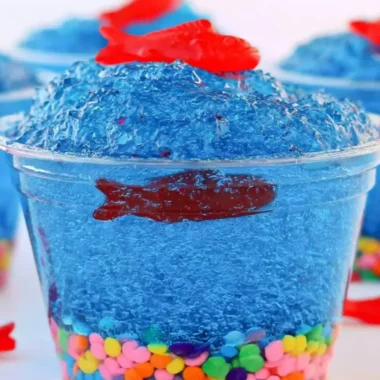 Mini Fish Tank Jell-O cups decorated with candy fish and aquatic plants