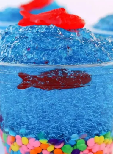 Mini Fish Tank Jell-O cups decorated with candy fish and aquatic plants