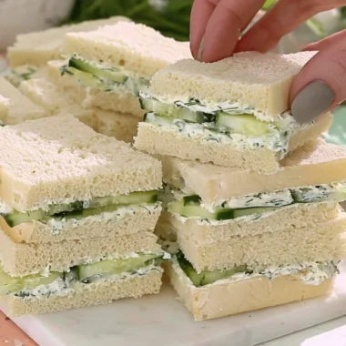 Delicious cucumber sandwiches served on a platter for tea time