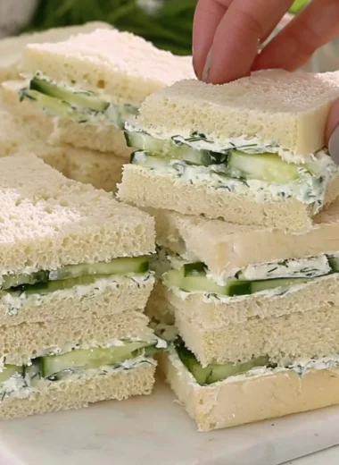 Delicious cucumber sandwiches served on a platter for tea time