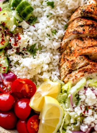 Delicious Greek Chicken Bowl with fresh vegetables and herbs