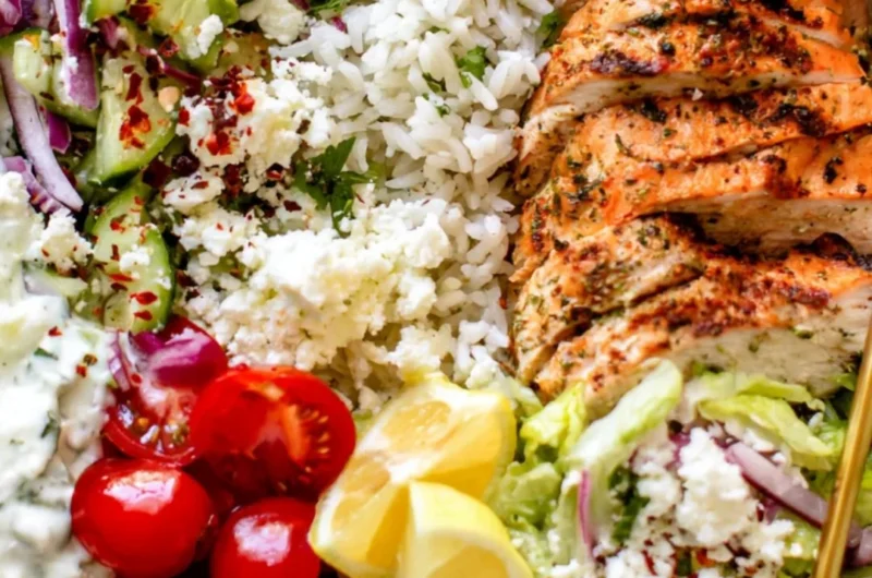 Delicious Greek Chicken Bowl with fresh vegetables and herbs