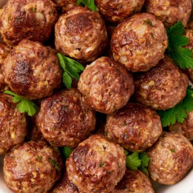 Delicious homemade meatballs ready to be frozen or served with pasta.