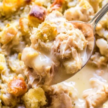 Delicious leftover turkey casserole served in a dish with vegetables and cheese.