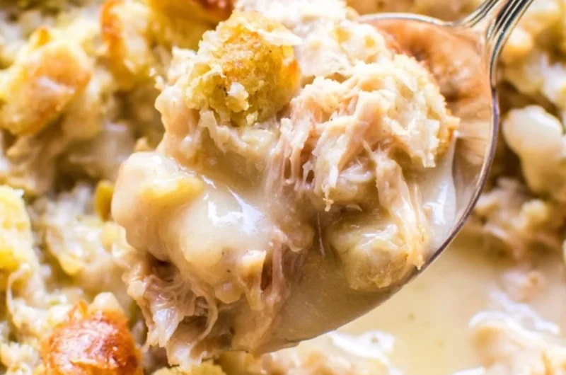 Delicious leftover turkey casserole served in a dish with vegetables and cheese.
