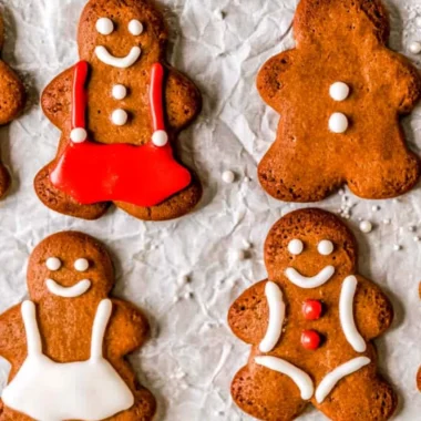 Soft and chewy gingerbread man cookies on a baking tray