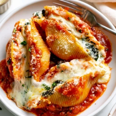 Delicious stuffed shells filled with ricotta cheese and marinara sauce
