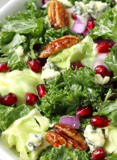 Winter Chopped Salad with Pomegranate and Blue Cheese served on a festive table